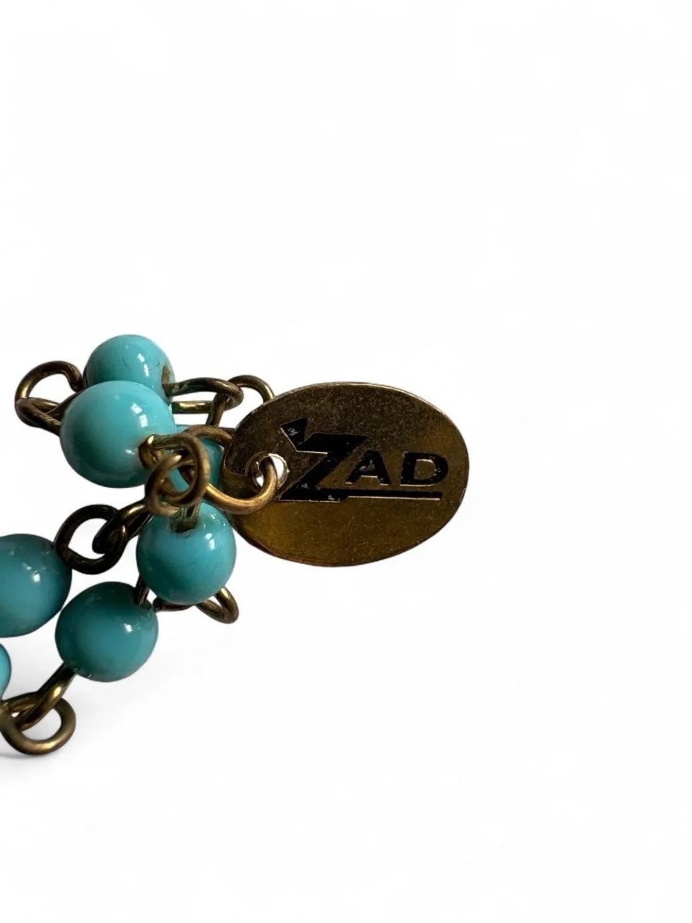 Vintage turquoise beaded necklace w carved faux-bone or horn tusk pendant